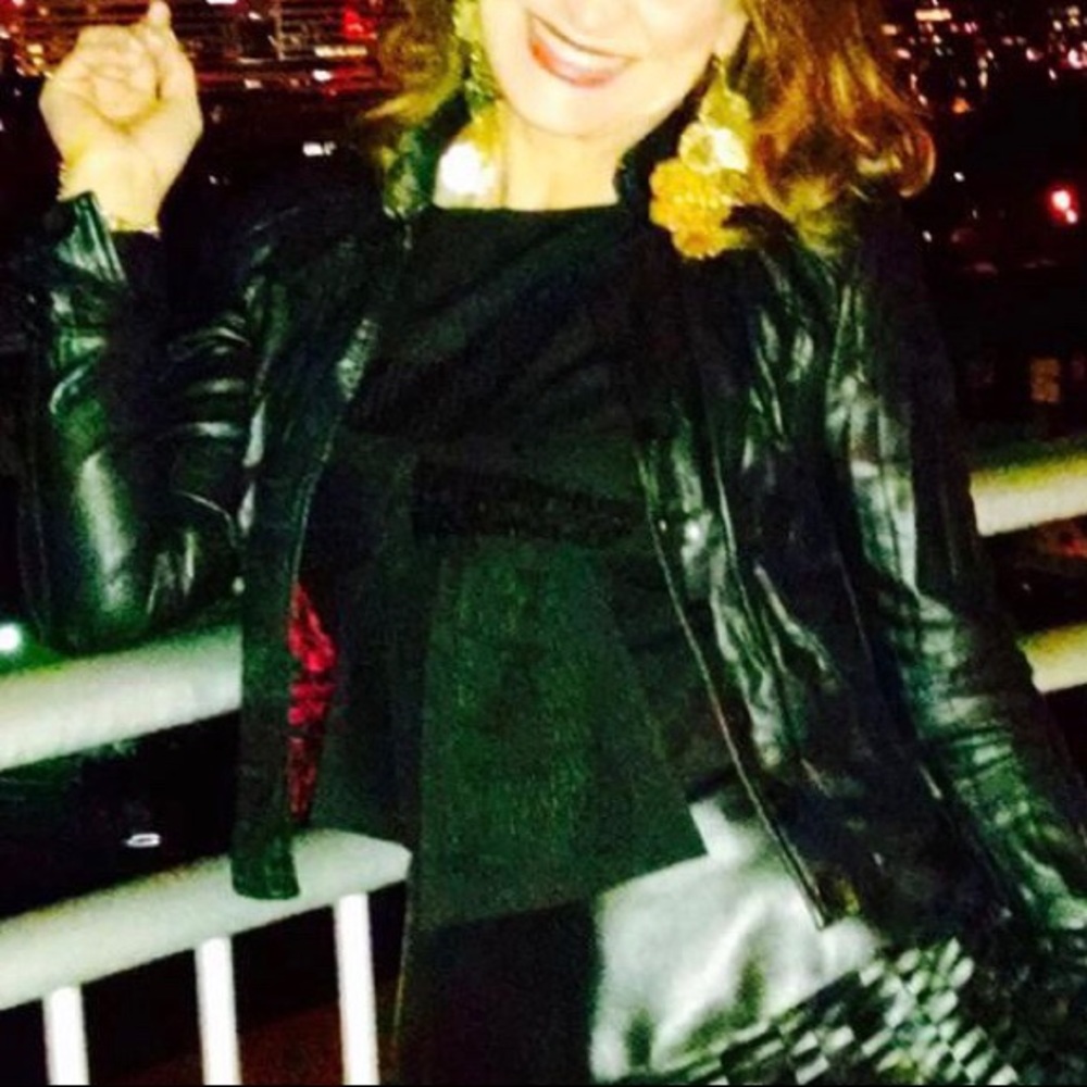 Black Kay Celine sequined short sleeve top.